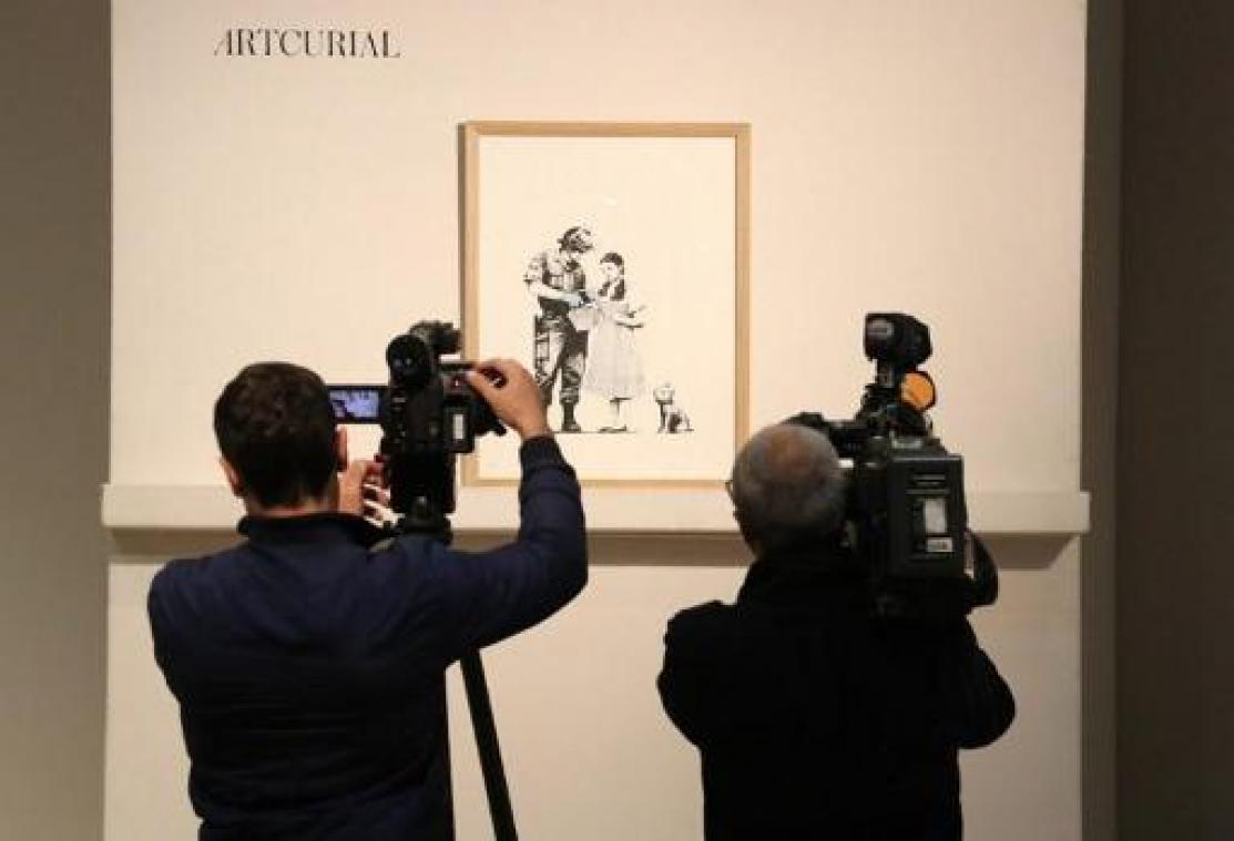 Geen nieuwe stunt en "bescheiden" bedragen op Banksy-veiling in Parijs