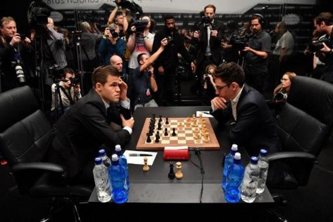 WK schaken - Carlsen en Caruana houden het in openingspartij na 115 zetten bij remise