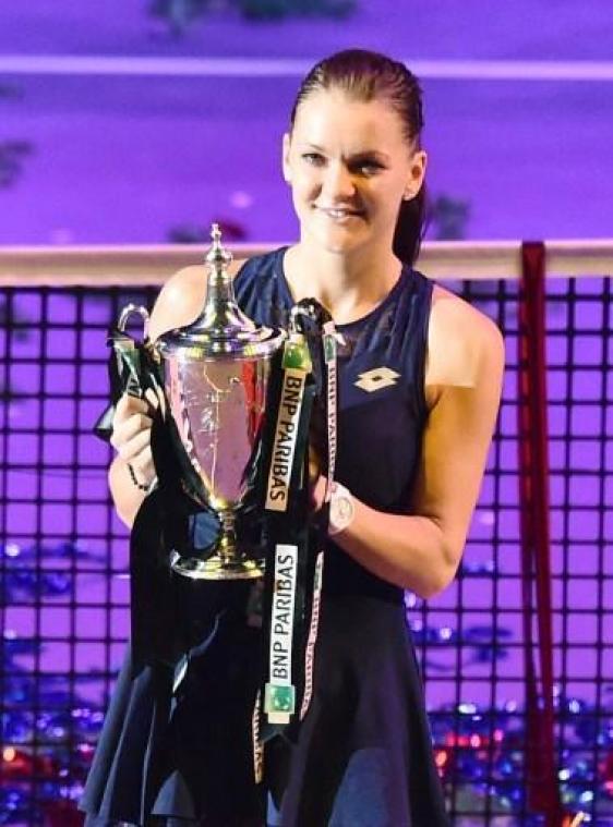 Agnieszka Radwanska bergt tennisrackets op