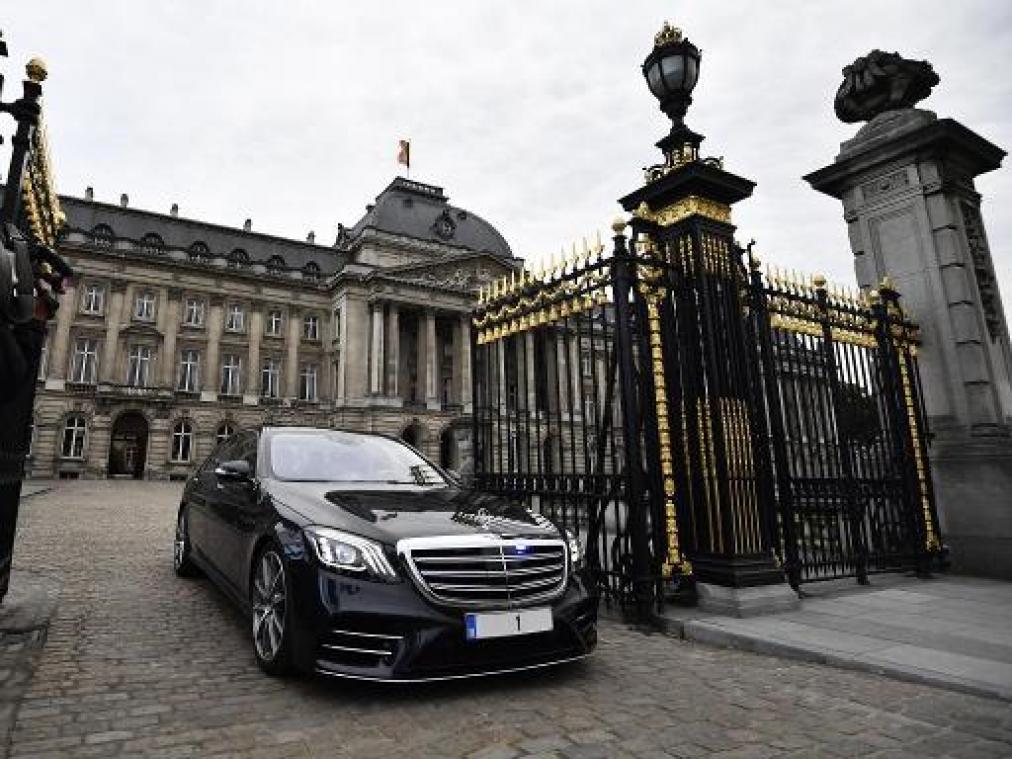 Koning ontvangt Reynders en Vande Lanotte