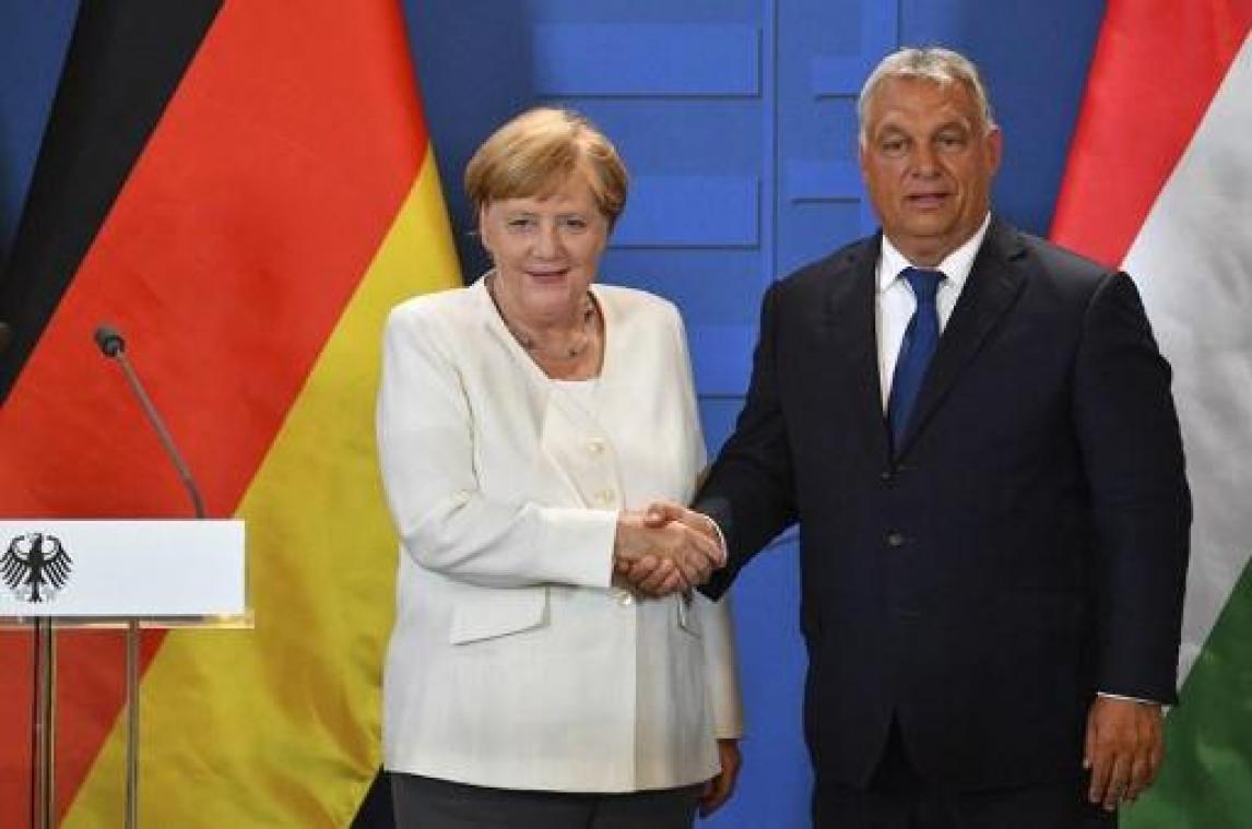 Merkel en Orban herdenken val IJzeren Gordijn