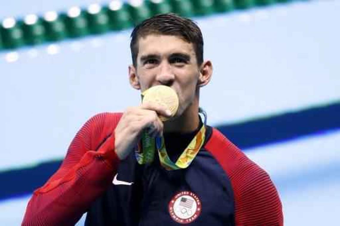 Michael Phelps na goud op 4x100m vrij: "Ongelooflijk"