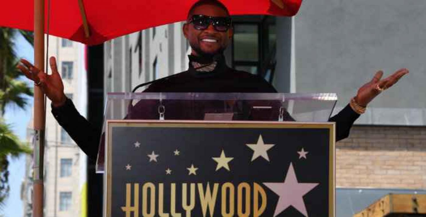 Usher vereeuwigd op Walk of Fame
