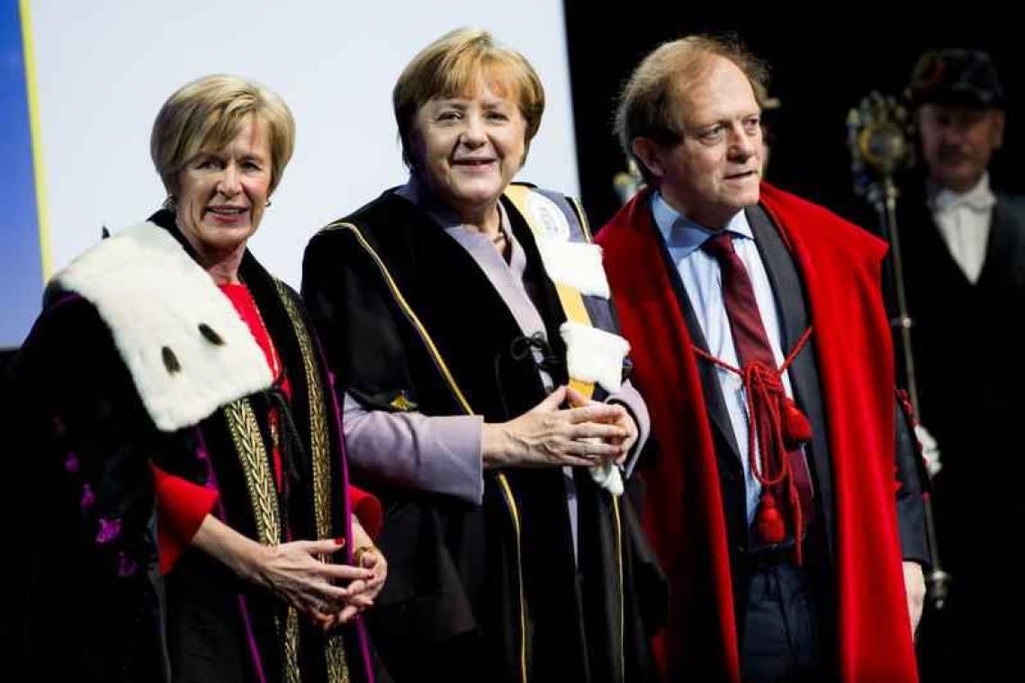 KU Leuven en UGent zetten Merkel in de bloemetjes