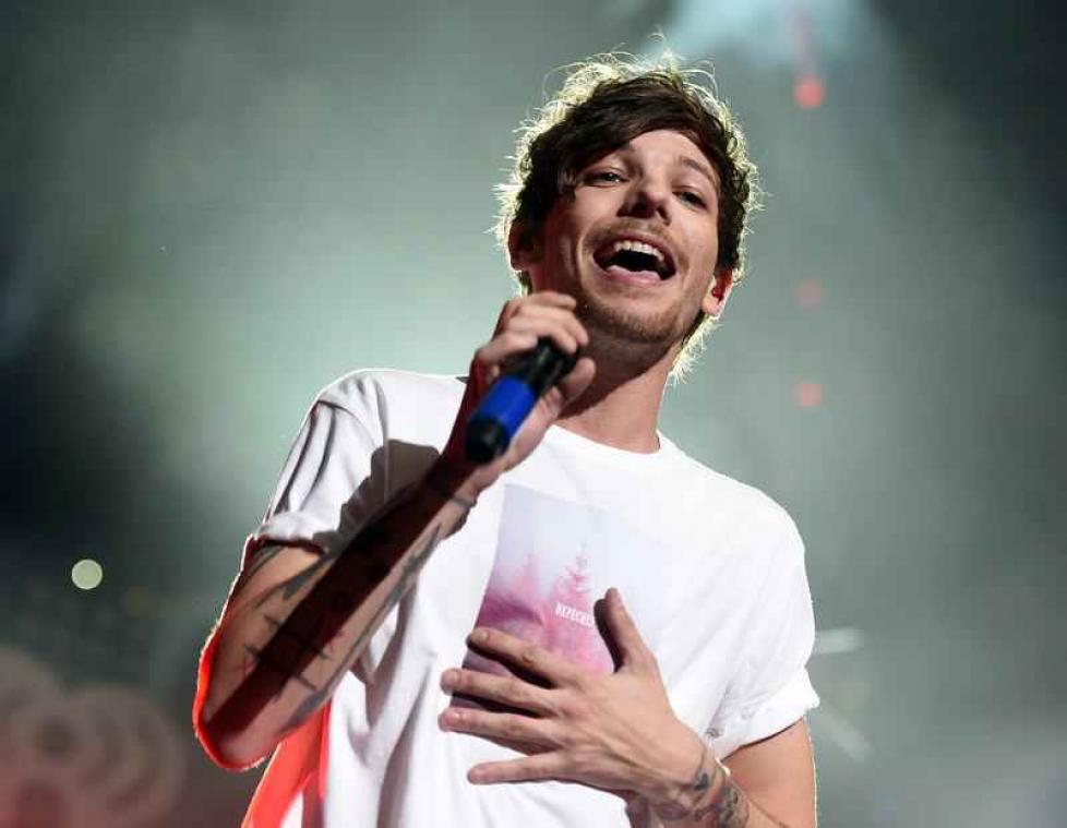 One Direction-lid opgepakt na ruzie met paparazzo