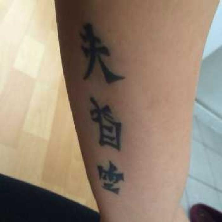 Man geeft echte vertaling van Chinese tatoeages op blog