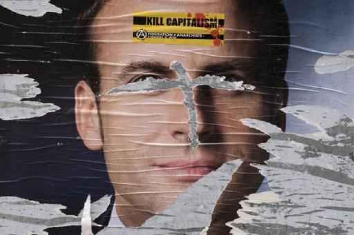 Franse presidentsverkiezingen - Macron wil strijd voor herstructurering van Griekse schuld aanvoeren