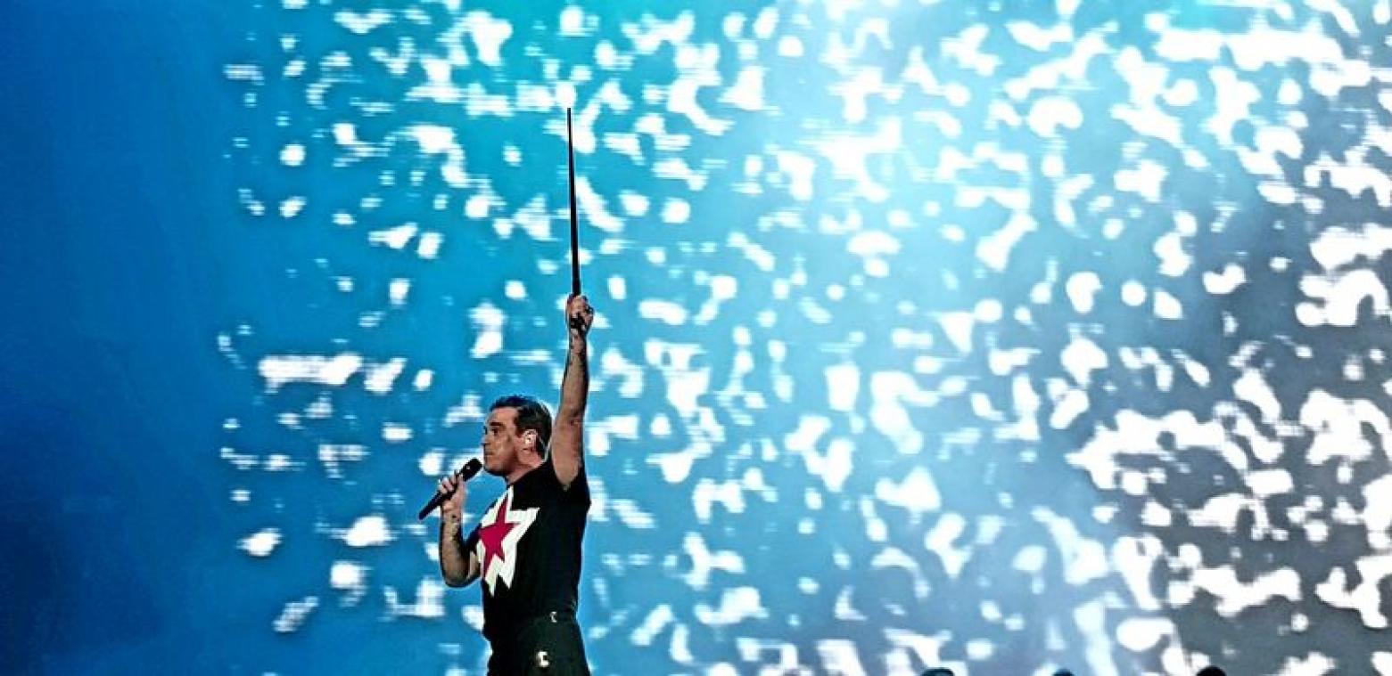 Robbie Williams kwam, zag en overwon op de weide van Werchter Boutique