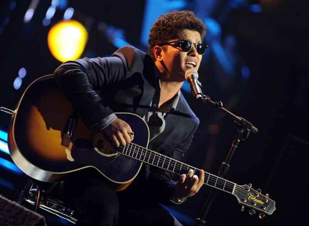 Bruno Mars aangeklaagd door fotograaf om babyfoto van ... zichzelf