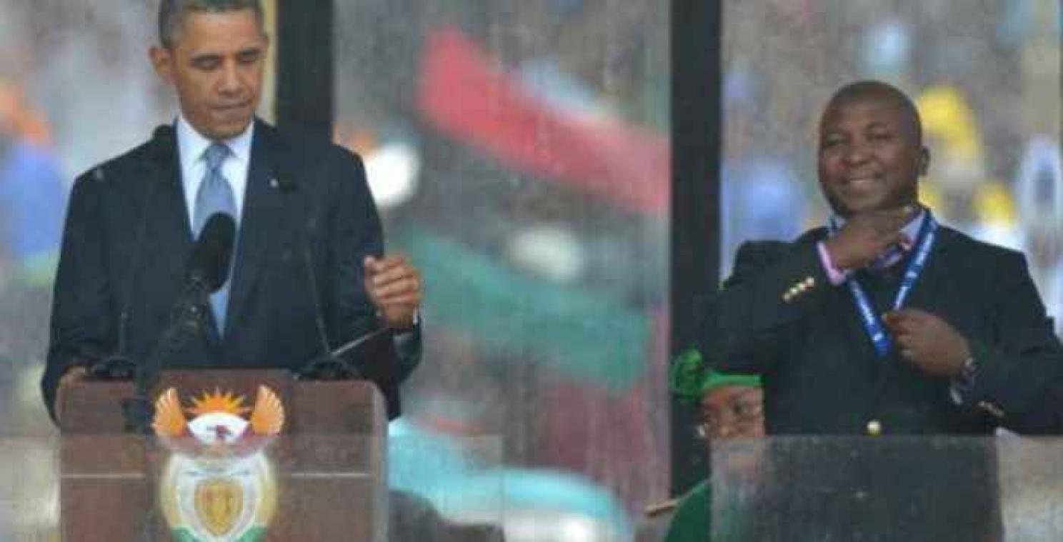 Wat gebaarde de doventolk nu precies op de begrafenisplechtigheid van Mandela?