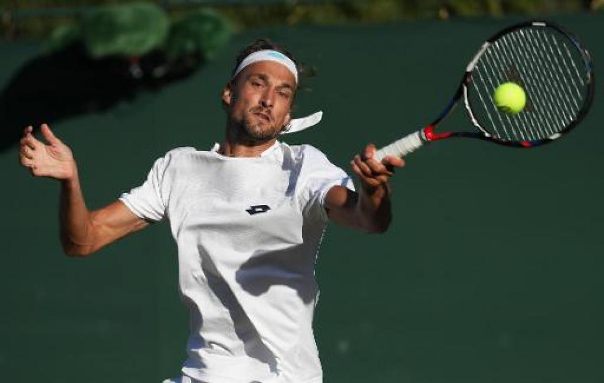Wimbledon - Wedstrijd van Ruben Bemelmans tegen Amerikaan Isner onderbroken door regen