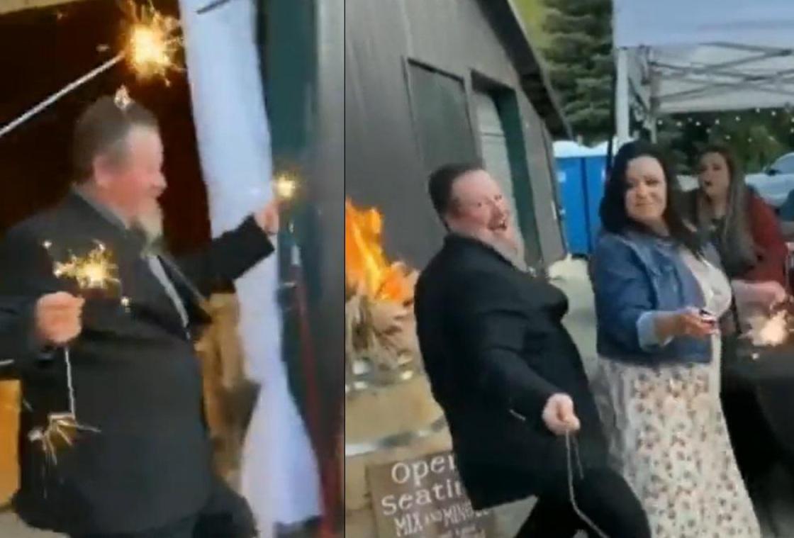 OEPS. Dronken man danst vrolijk met vuurwerk, maar heeft niet in de gaten dat hij brand sticht (video)