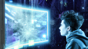 DALL·E 2023-01-19 16.28.33 - futuristic image of a human sitting at desk in fron